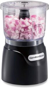 Compact black electric vegetable chopper and food processor with 3-cup bowl for onions, nuts, and purees